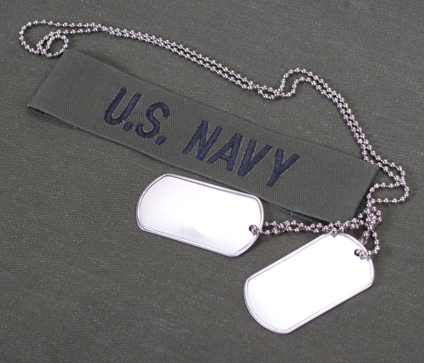 Why did the Navy stop issuing Dog tags?